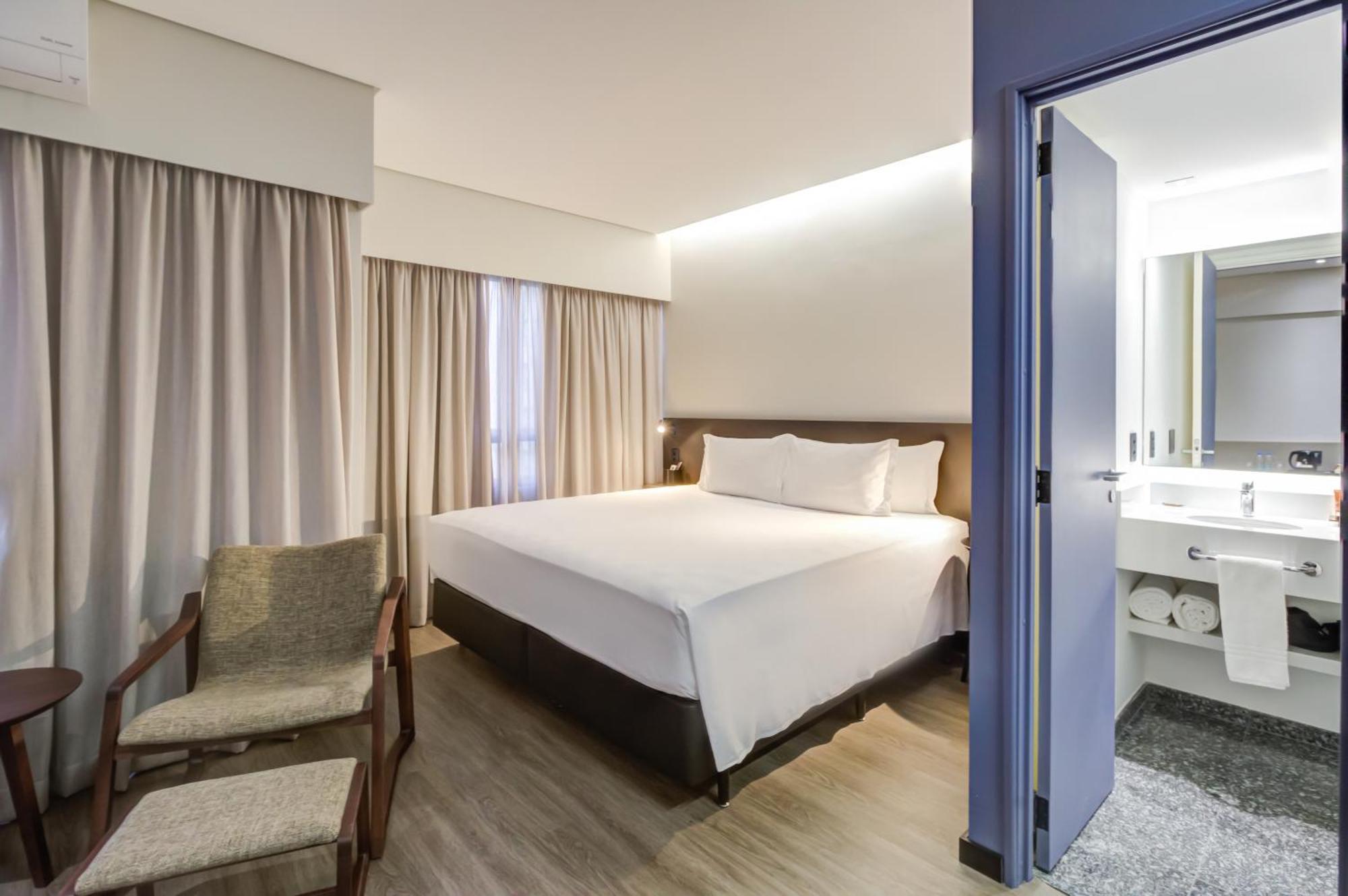 Radisson Sao Paulo Paulista Hotel Exterior foto A bedroom at the hotel
